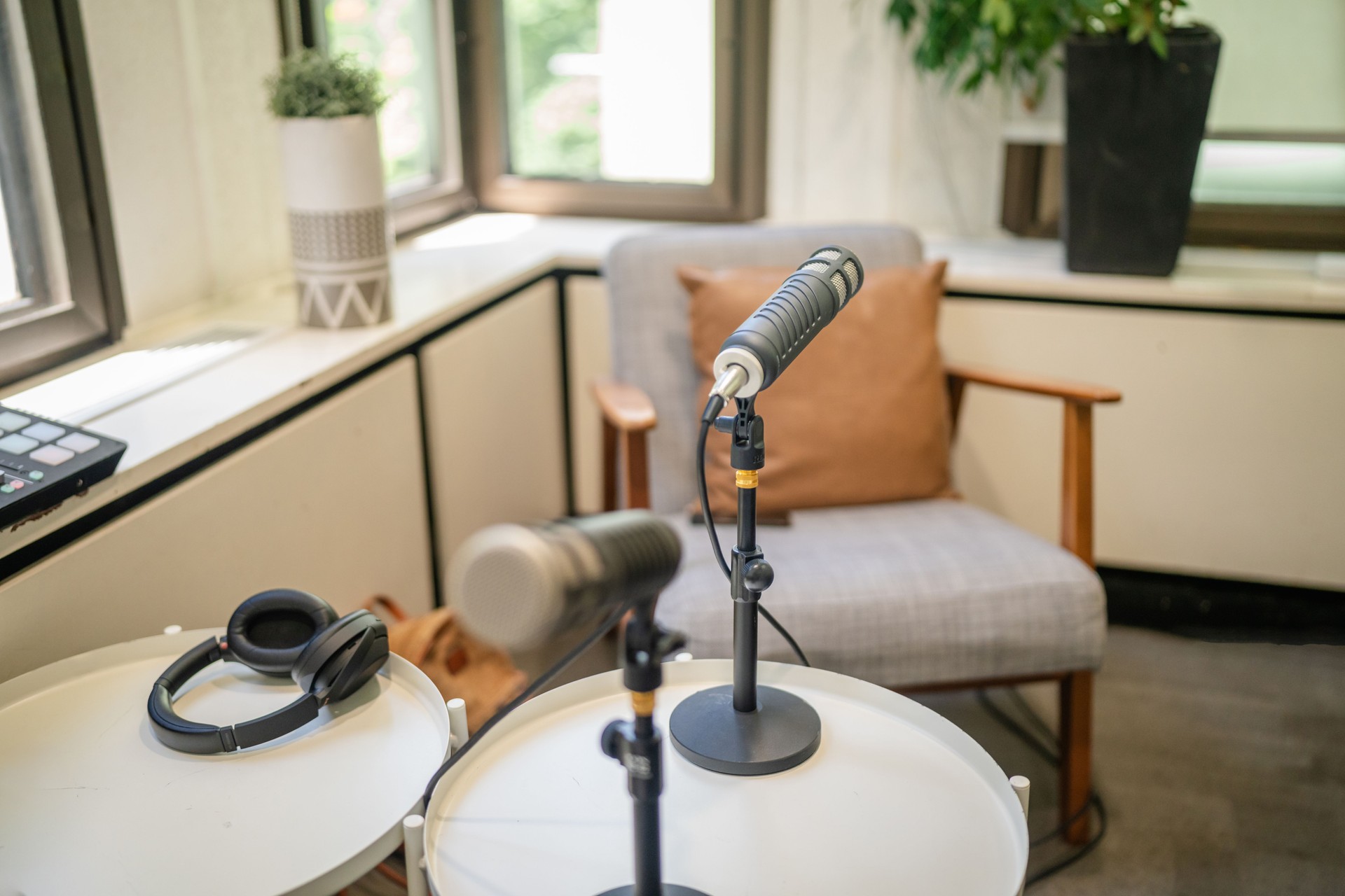 Recording setup in a cozy Sydney studio with microphones and headphones ready for a session